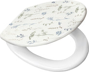 WC-Sitz mit weißem Deckel und feinen floralen Blumen- und Gräsermotiven