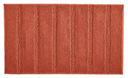 Rechteckige, rostrote Badematte mit breiten, strukturierten Streifen