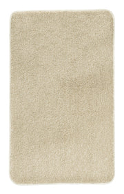 Badteppich RELAX in Sandbeige mit weicher Oberfläche im Format 60 x 100 cm liegt flach.