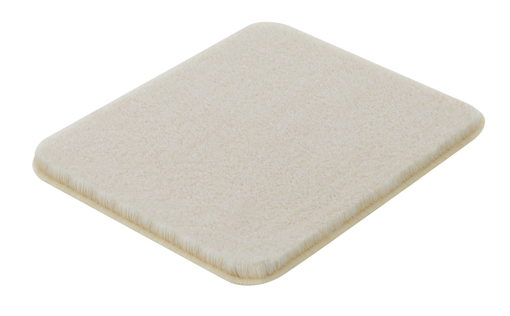 Badteppich RELAX Sandbeige 55 x 65 cm liegt rechteckig und flach auf weißem Untergrund.