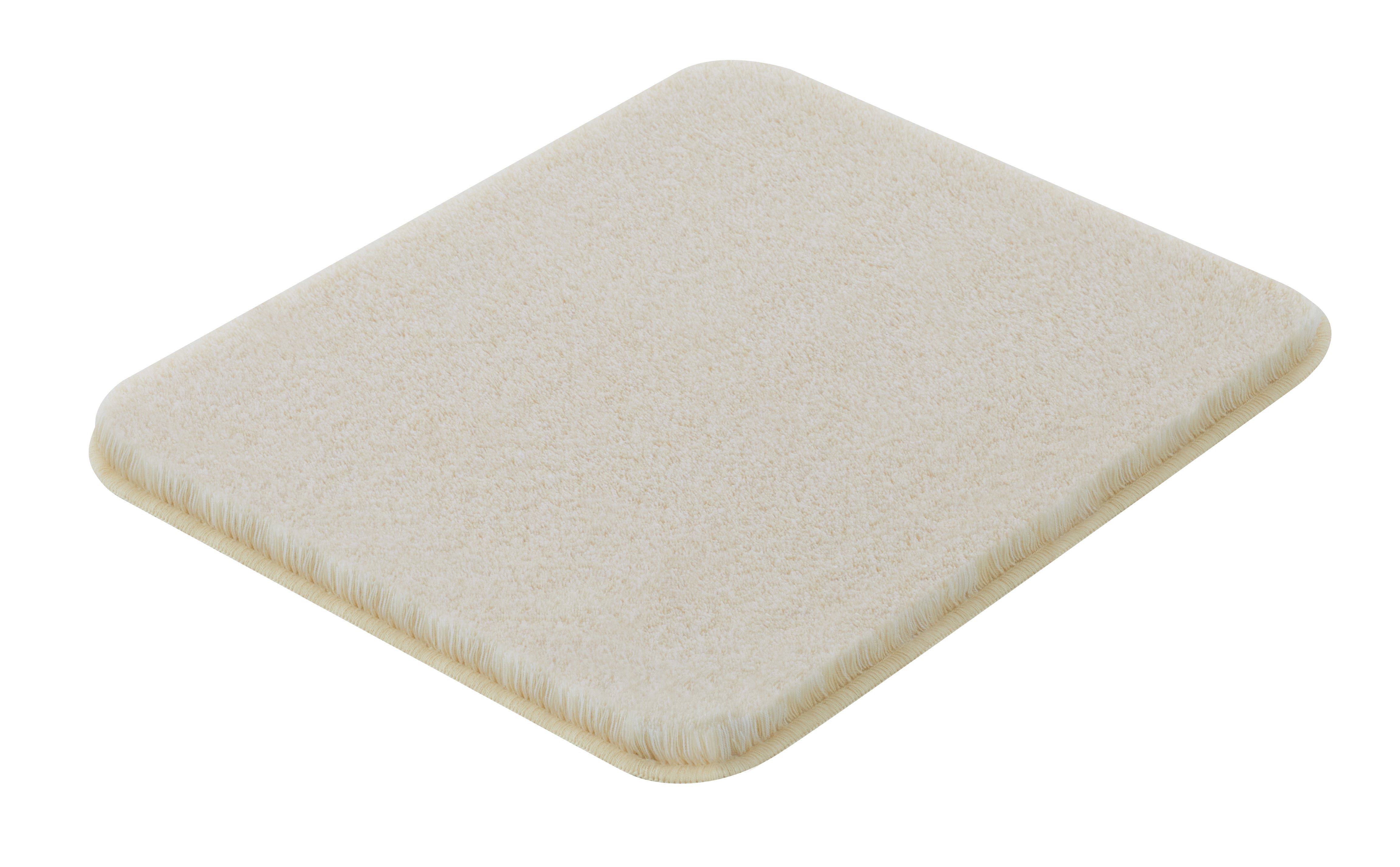 Badteppich RELAX Sandbeige 55 x 65 cm liegt rechteckig und flach auf weißem Untergrund.