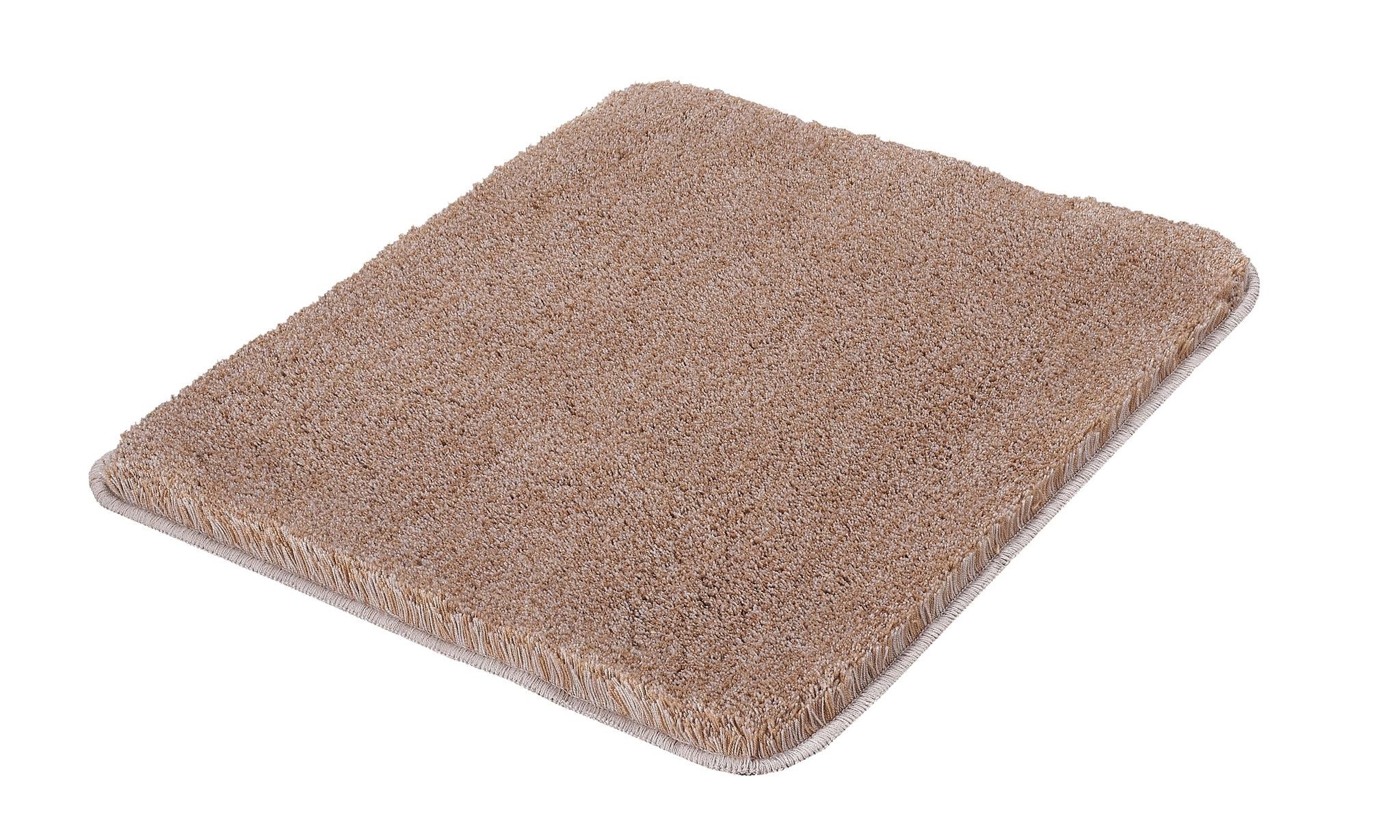 Rechteckige, beige Badematte mit dichtem, weichem Hochflorteppich