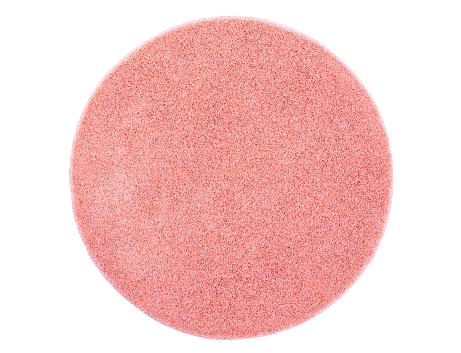 Runder, flauschiger, lachsfarbener Badteppich aus Textil von oben
