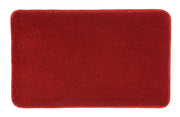 Badteppich RELAX Rubin 60 x 100 cm liegt flach und vollständig sichtbar auf hellem Untergrund.