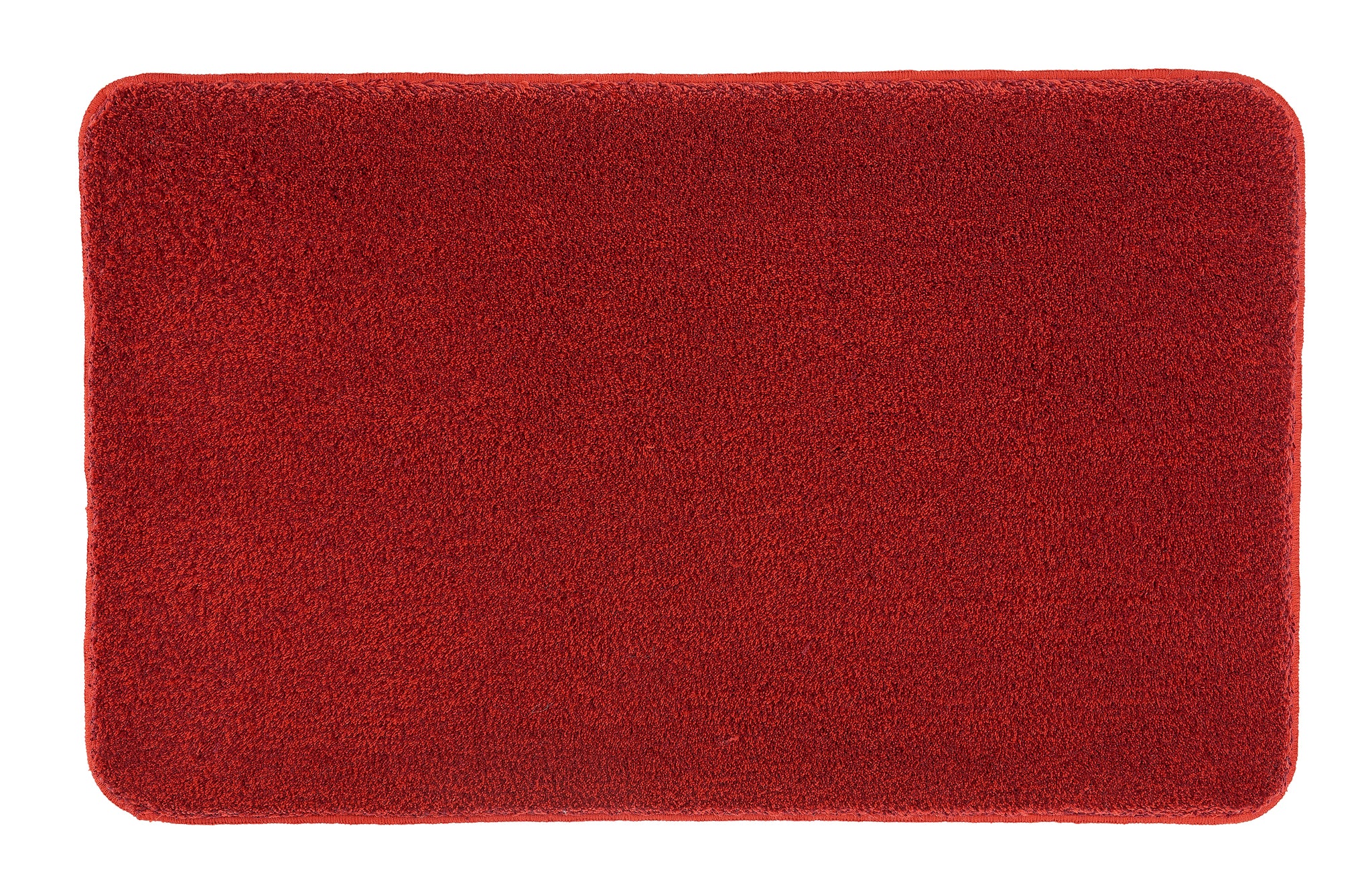 Badteppich RELAX Rubin 60 x 100 cm liegt flach und vollständig sichtbar auf hellem Untergrund.