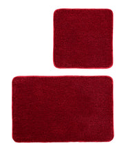 Badteppich-Set RELAX Rubin mit zwei roten Teppichen in 50x50 cm und 55x85 cm ist abgebildet.