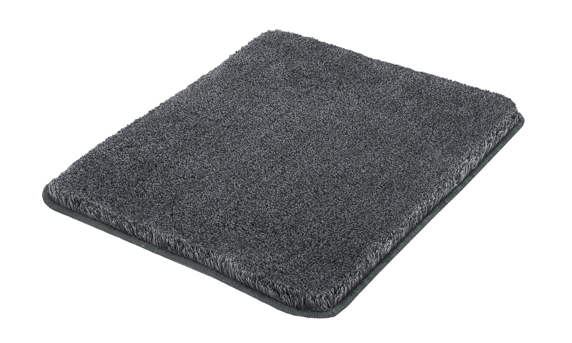 Rechteckiger Badteppich RELAX in Anthrazit 55 x 65 cm liegt flach auf dem Boden.