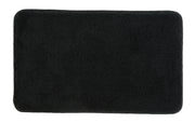 Rechteckige schwarze Badematte mit weicher Oberfläche von oben ansicht