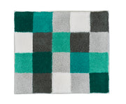 Badteppich CARO Petrol 55 x 65 cm mit kariertem Muster in Petrol, Grau, Weiß und Grün von oben gezeigt.