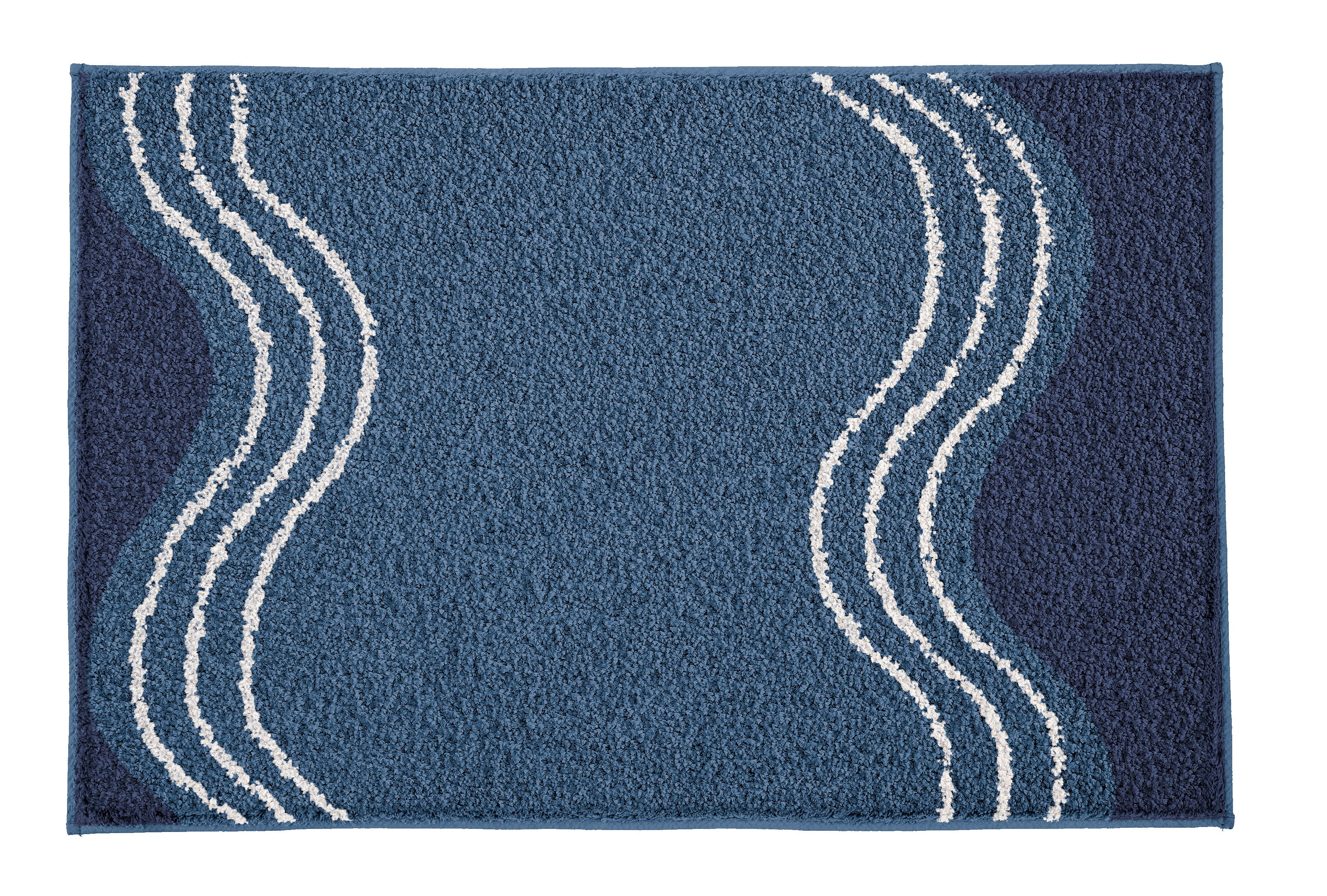 Badteppich MOVE Iceblue 60 x 90 cm mit geschwungenen weißen Linien auf blauem Grund liegt flach.