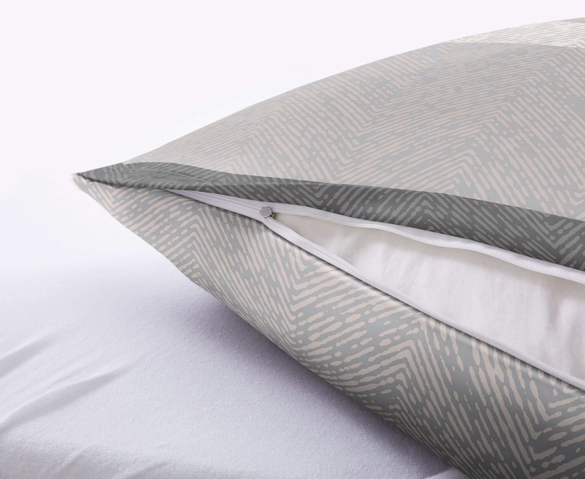 Graues Zierkissen mit geometrischem Muster und Reißverschluss