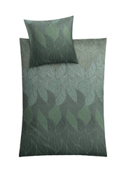 Dunkelgrüne Bettwäsche mit feinem Blätterdruck und passendem Kissen