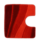 Roter WC-Badvorleger mit geschwungenen Streifen in Rot- und Orangetönen