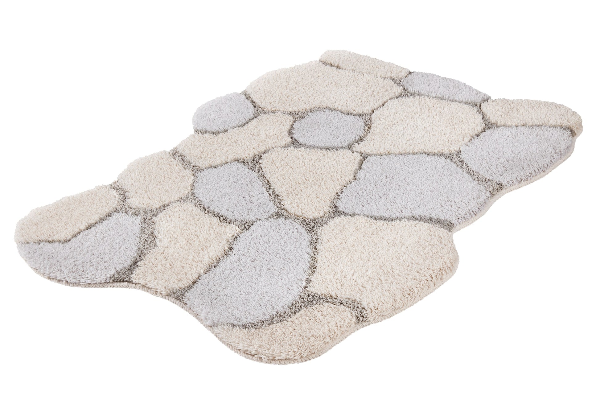 Der flauschige Teppich zeigt ein Kieselsteinmuster in Beige und Grau.