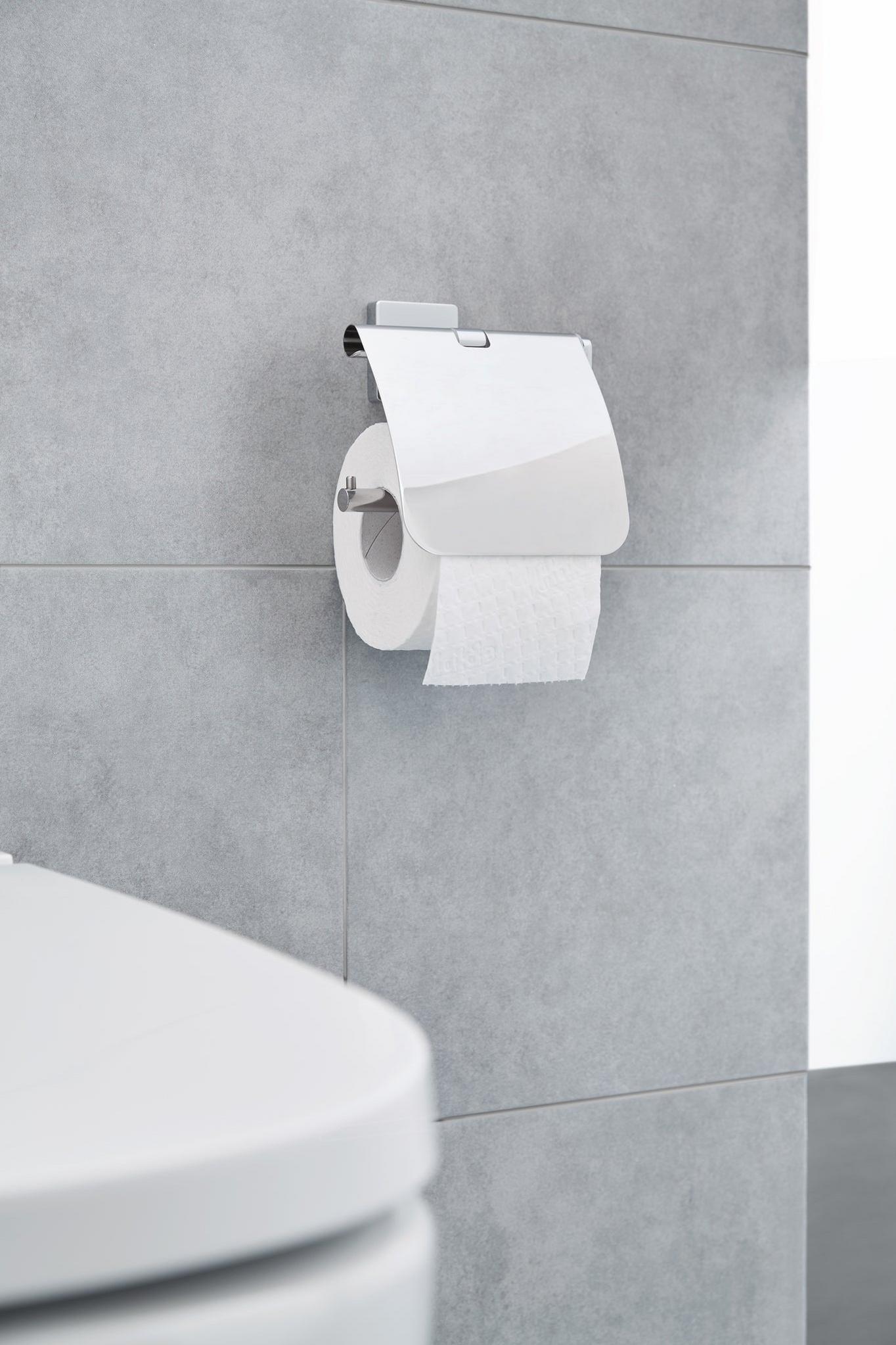 Wandmontierter Toilettenpapierhalter aus Chrom mit weißer Papierrolle