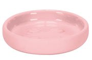Runde Seifenschale ECLIPSE in Pastellrose liegt leer vor weißem Hintergrund.