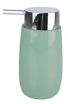 Mintgrüner, zylindrischer Seifenspender mit silbernem Pumpkopf oben