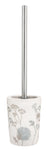 WC-Bürste mit silbernem Stiel in weißem Halter mit Blumenmotiv dekoriert