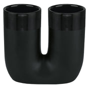 Der Zahnbürstenhalter DEEP Schwarz steht als doppelter Becherhalter frei auf einer Fläche.