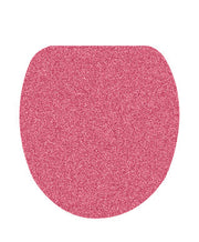 Rosa WC-Sitz mit glitzernder Oberfläche in dekorativer ovaler Form