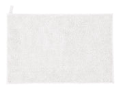Der Badteppich VITA in Weiß mit 50 x 80 cm liegt flach auf hellem Untergrund.