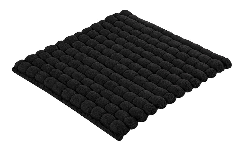 Schwarzer rechteckiger Badvorleger mit weich gepolsterter Struktur