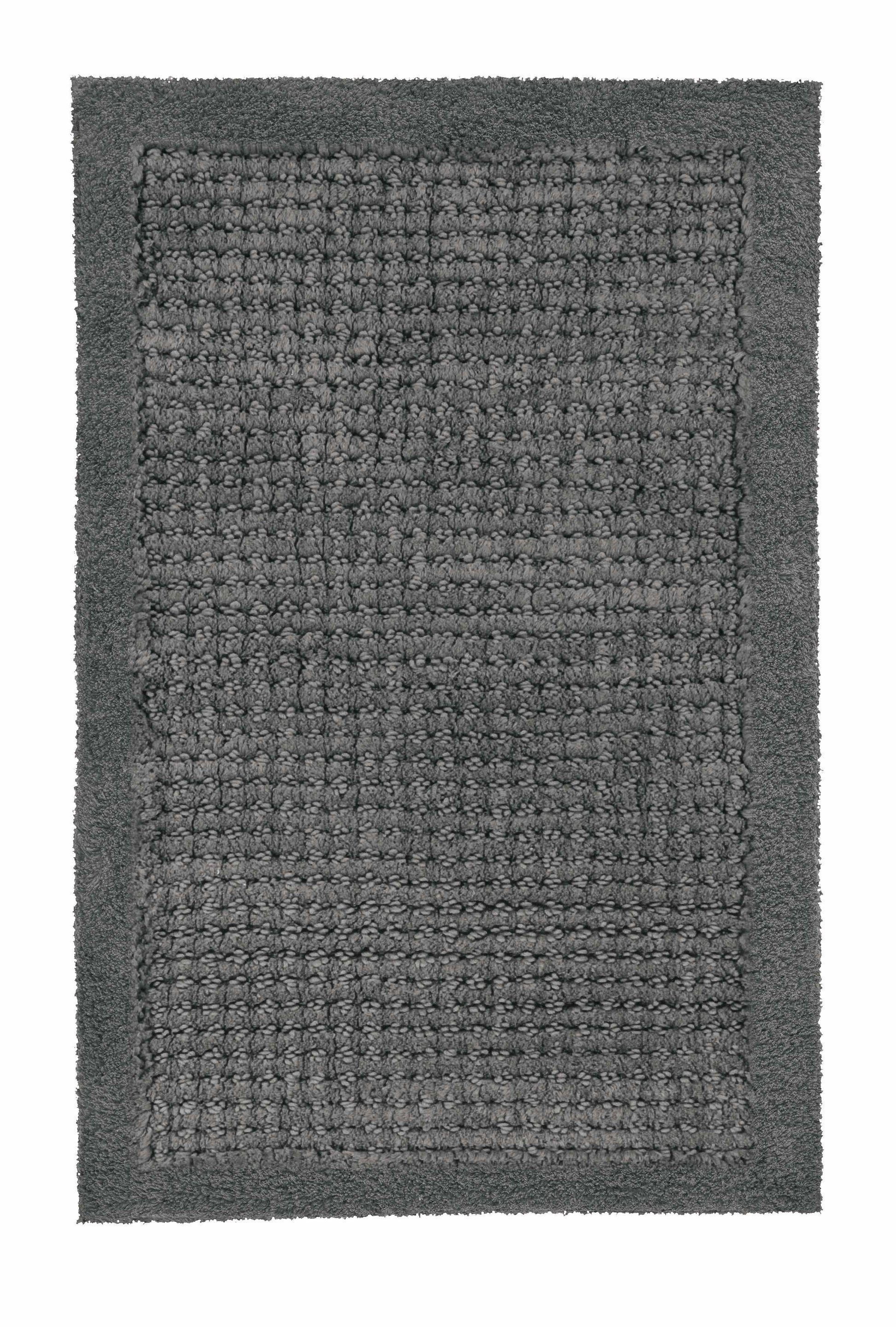 Badteppich NET Schiefer 60 x 90 cm liegt rechteckig mit Strukturflor auf hellem Hintergrund.