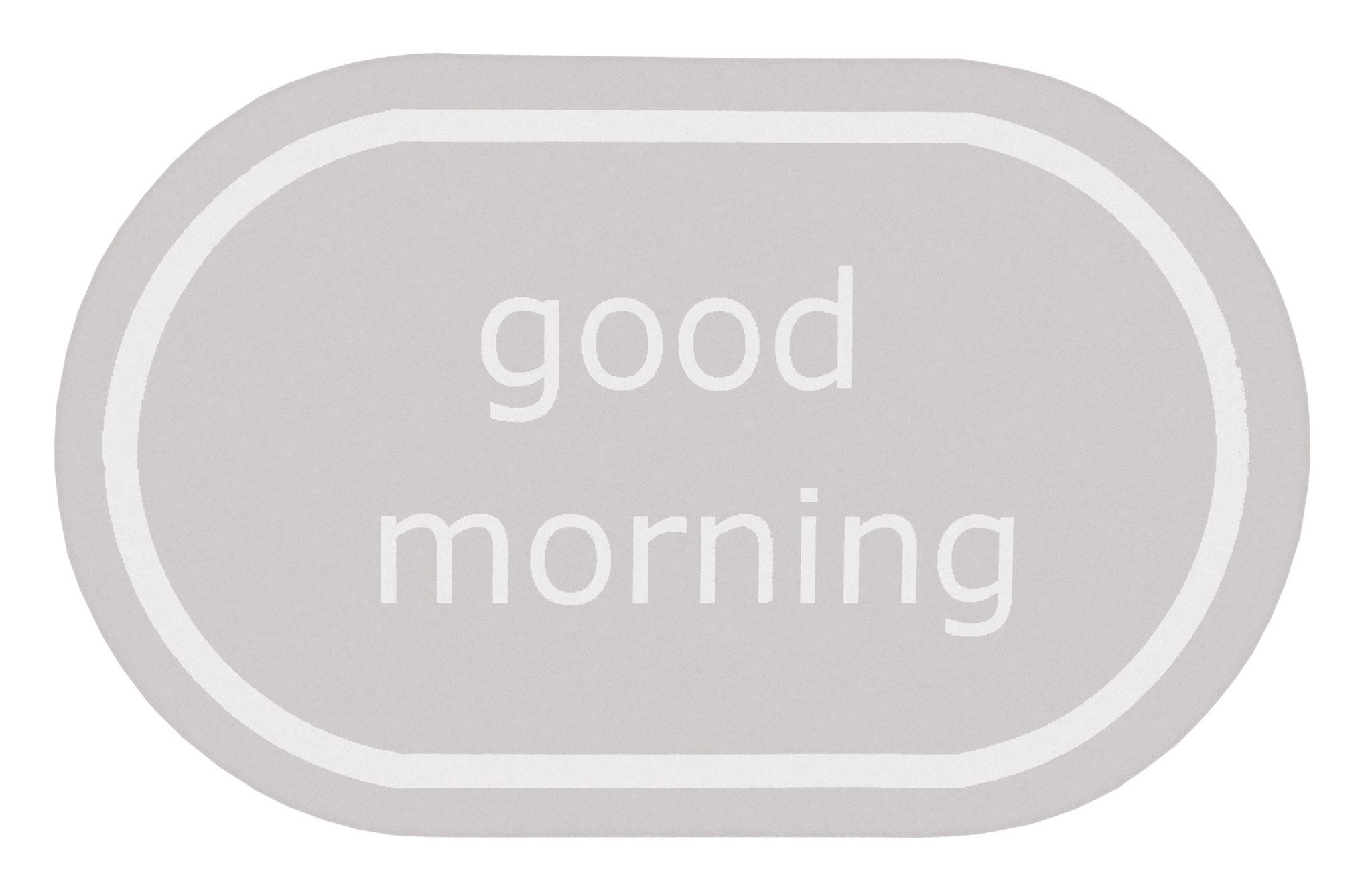 Ovaler hellgrauer Badteppich mit weißem Schriftzug good morning