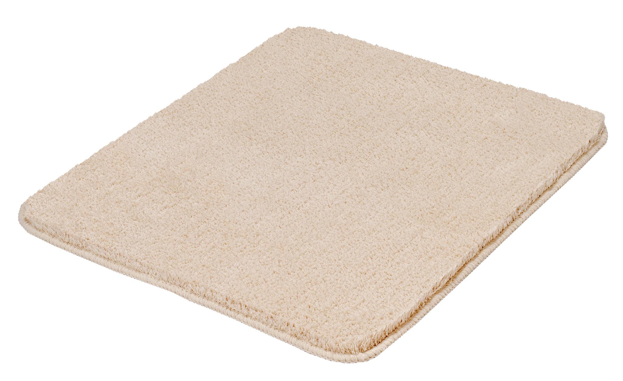 Rechteckige, flache Badematte aus beigefarbenem, dichtem Flor Textil