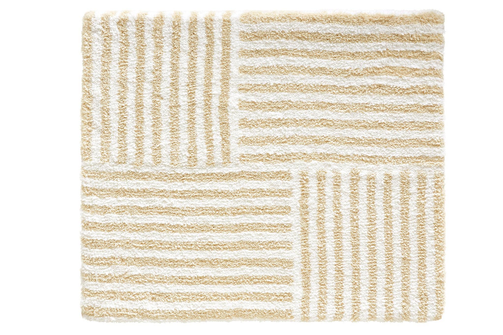 Beige-weiße Badematte mit gestreiftem Blockmuster aus Quadraten im Design