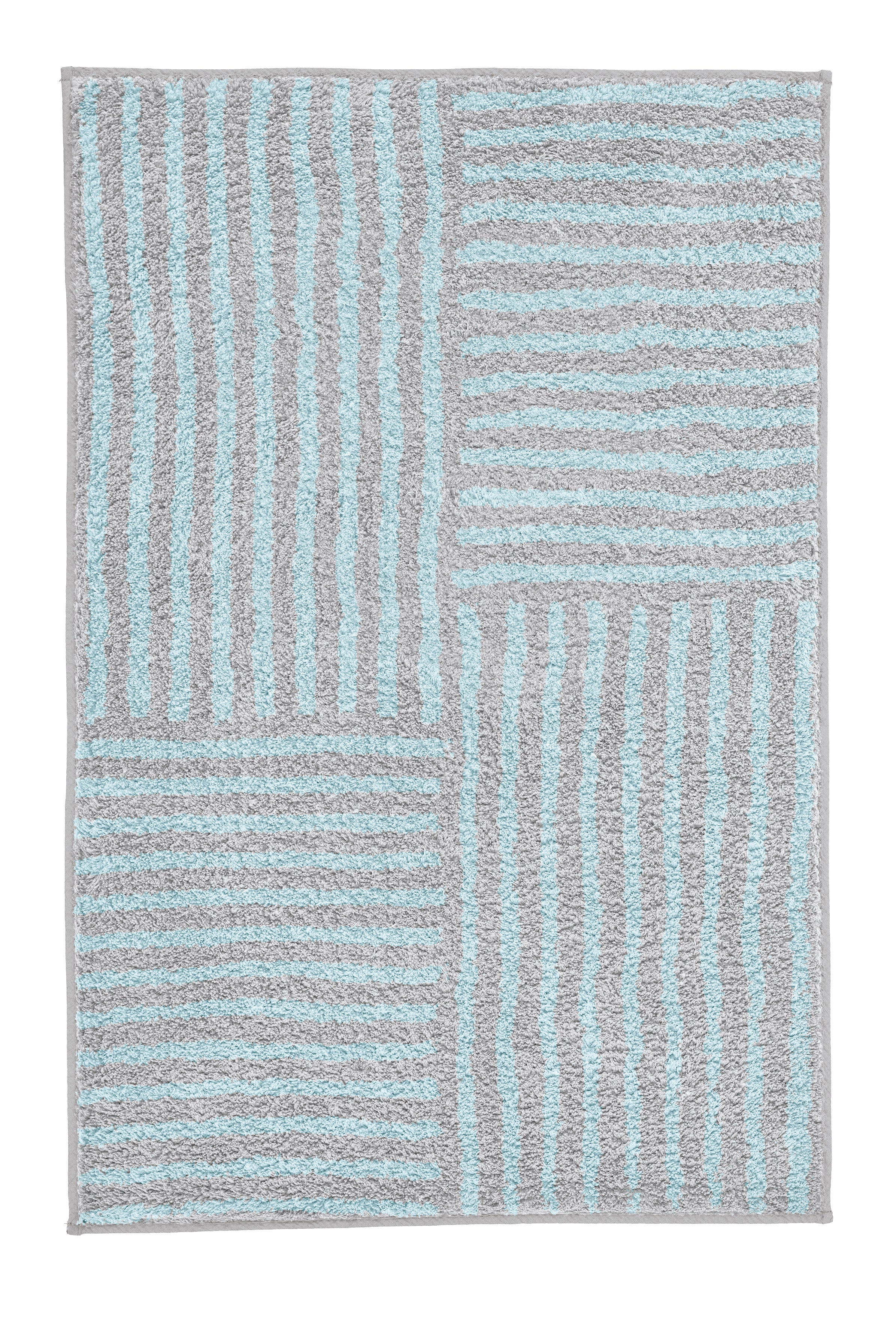 Badteppich CHELSEA Opal 60 x 90 cm zeigt graue und hellblaue Streifen in rechteckigem Patchworkmuster.