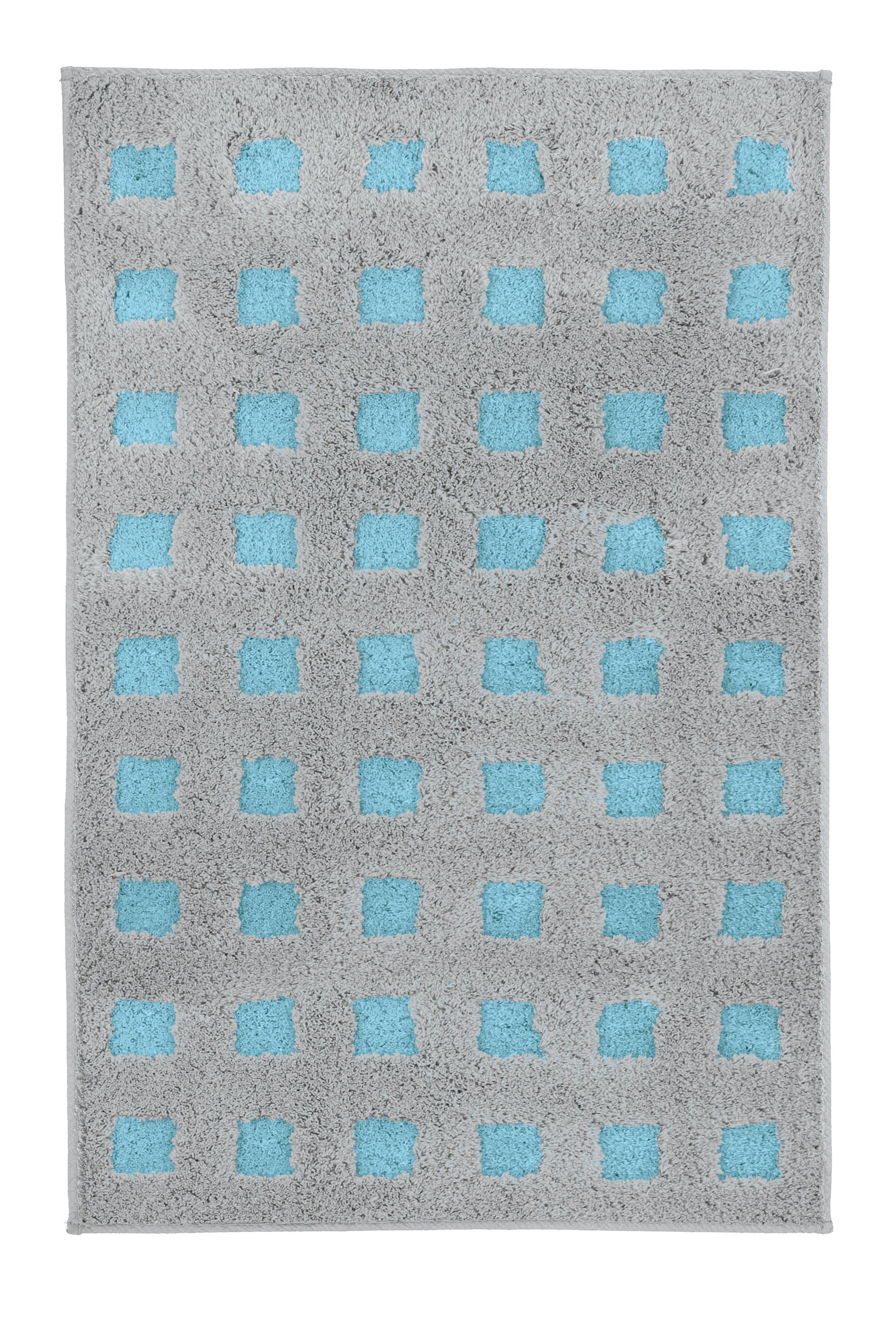 Badteppich BOXES Opal 60 x 90 cm mit grauer Fläche und blauen Quadraten ist von oben zu sehen.