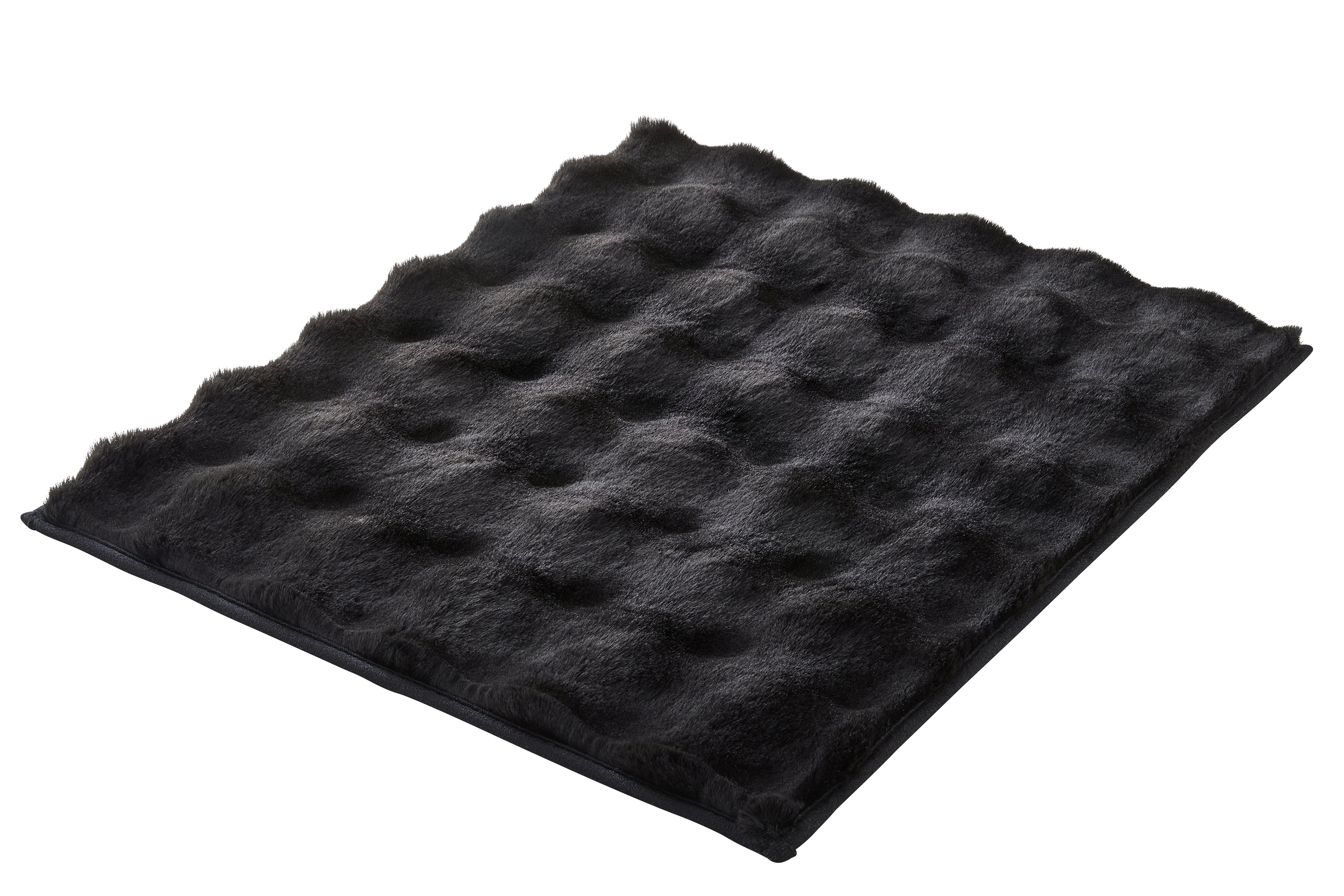 Der Badteppich CLOUD Schwarz 50 x 60 cm liegt flach und zeigt seine strukturierte, flauschige Oberfläche.