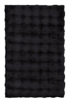 Schwarzer, rechteckiger, flauschiger Badteppich mit welliger Struktur