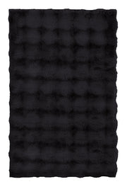 Badteppich CLOUD Schwarz 60 x 90 cm liegt flach und zeigt seine flauschige Struktur.