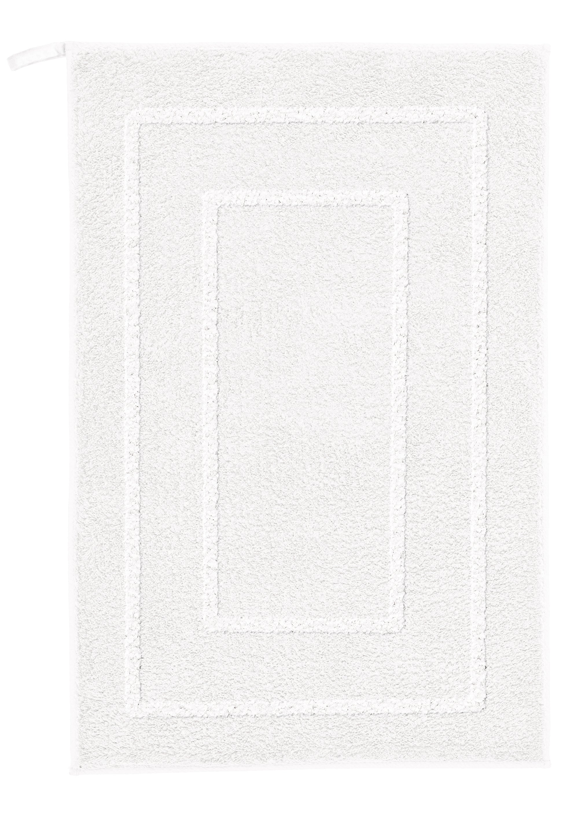 Badteppich NICO in Weiß mit 50 x 80 cm liegt rechteckig ausgebreitet und wird von oben gezeigt.