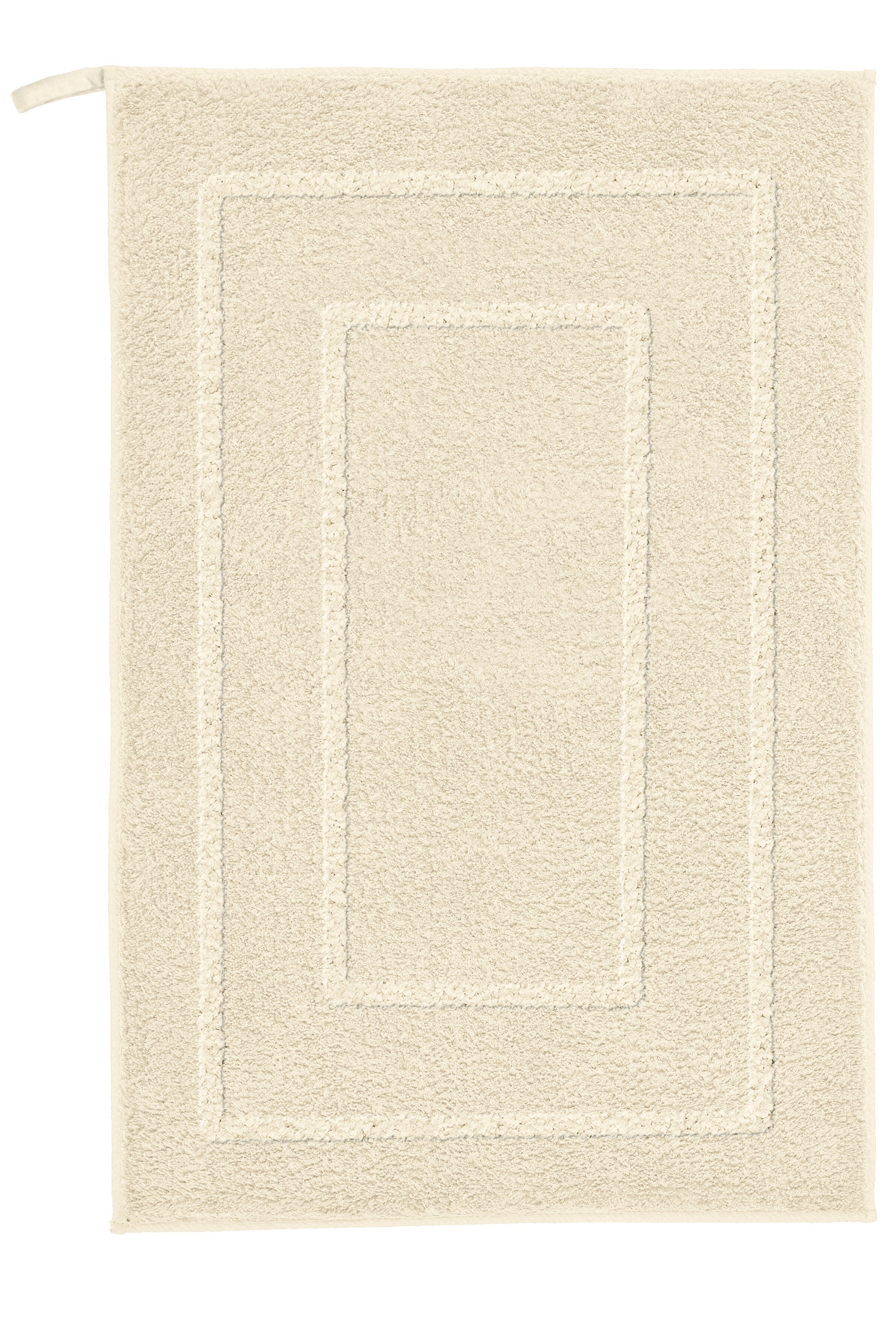 Badteppich NICO Sandbeige 50x80 cm liegt flach und zeigt seinen rechteckigen Hoch-Tief-Rahmen.