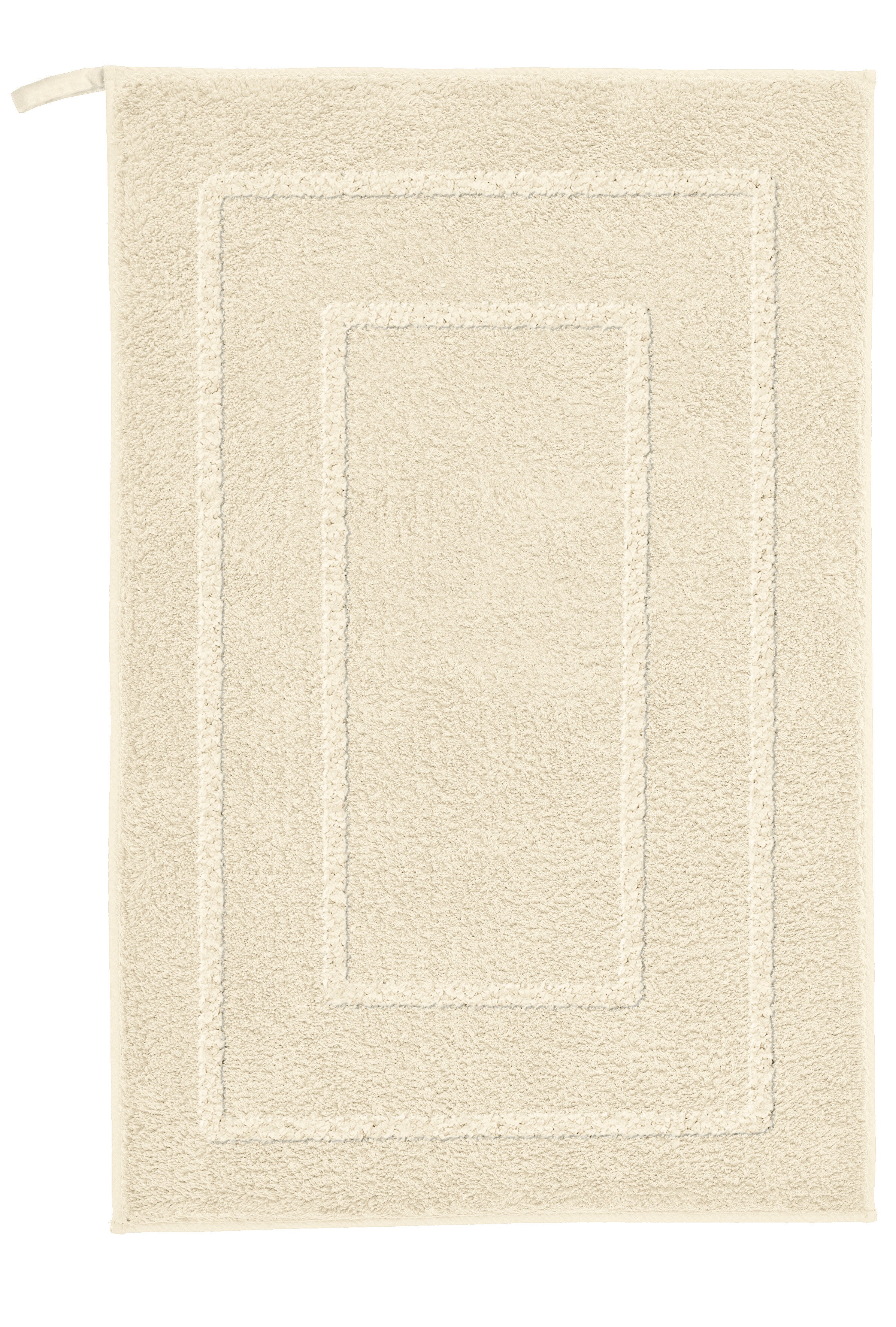 Badteppich NICO Sandbeige 50x80 cm liegt flach und zeigt seinen rechteckigen Hoch-Tief-Rahmen.