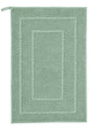 rechteckige grüne Badematte mit umlaufendem eingewebtem Rahmen