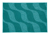 Türkisfarbige Badematte mit wellenförmigem Muster in zwei Tönen