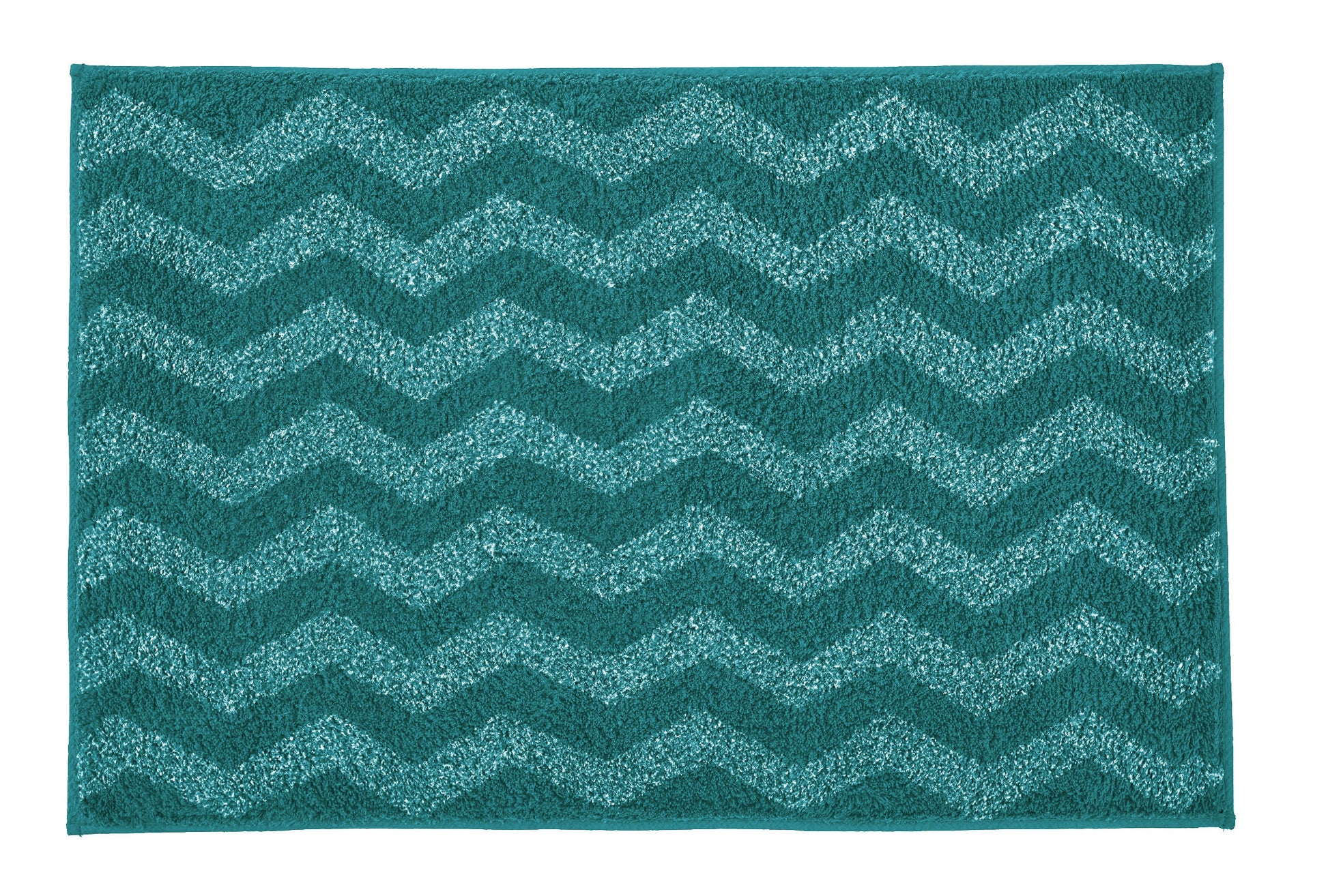 Türkisfarbene Badematte mit Zickzackmuster auf einfarbigem Hintergrund