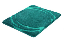 Rechteckige petrolfarbene Badematte mit dezentem Bogenmuster aus Hochflor