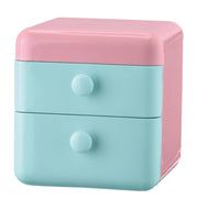 Bad-Organizer COSMA Salbeigrün M mit zwei pastellfarbenen Schubladen ist im Bild zu sehen.