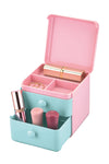 Rosa-türkise Kosmetikbox mit offenen Fächern und Make-up-Produkten