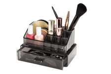 Schwarzer Acryl-Organizer mit Make-up, Pinseln und Schmuckschublade