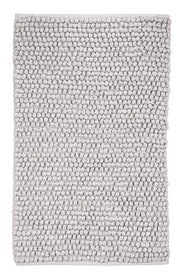 Badteppich BRAVA in Silbergrau 70 x 120 cm liegt flach mit strukturierter Oberfläche.
