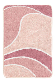 Rosafarbiger Badteppich mit geschwungenem Muster in Rosa und Weiß.