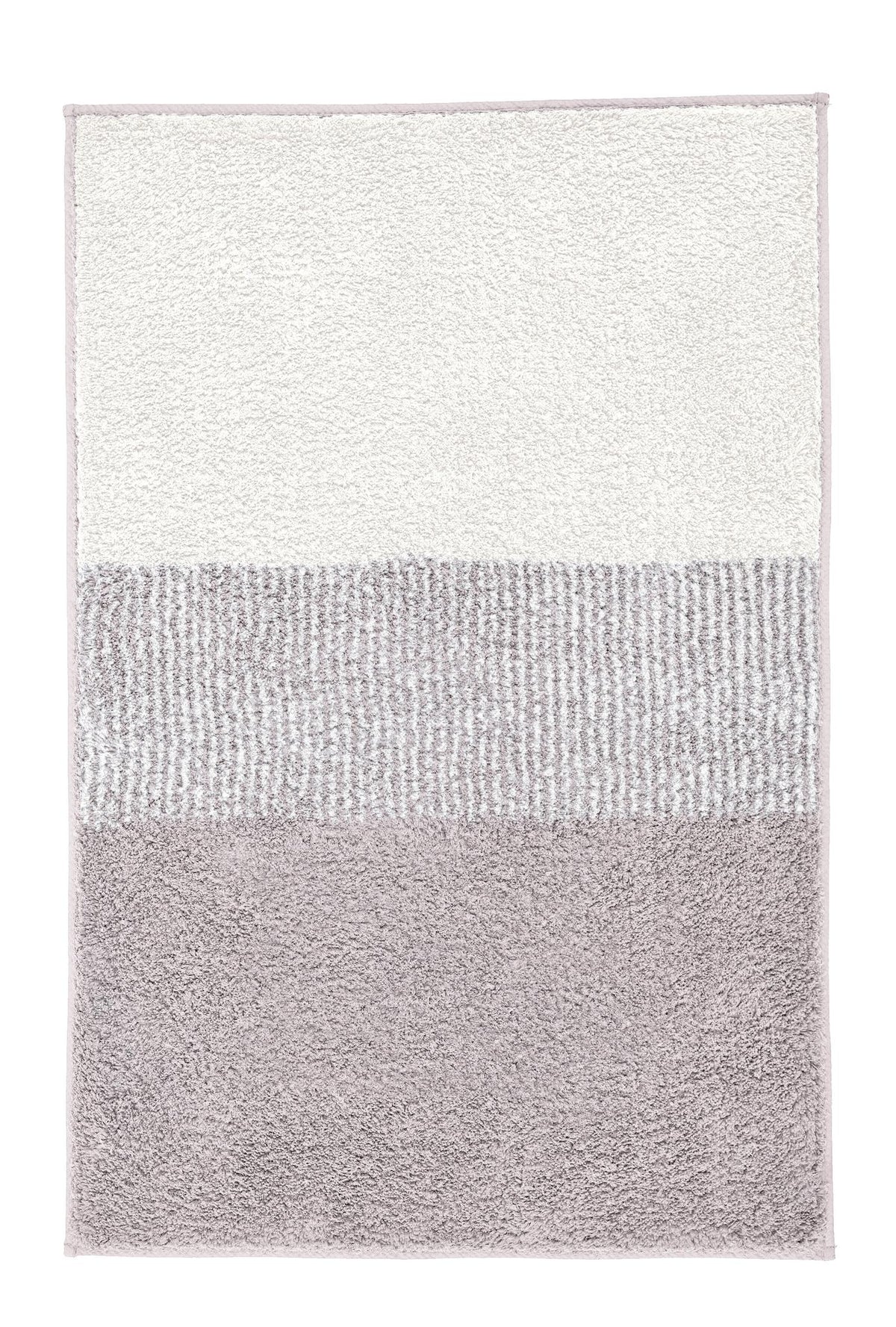 Rechteckiger Badteppich in Creme und Taupe mit weichem Farbverlauf.