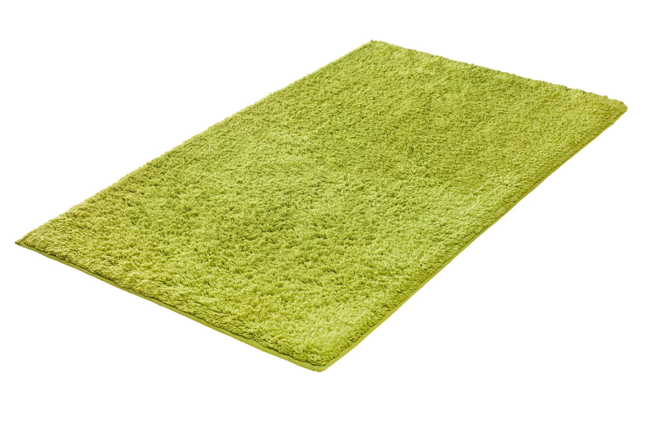 Badteppich CHRISSY Palme 60 x 100 cm in Grün liegt flach auf weißem Hintergrund.