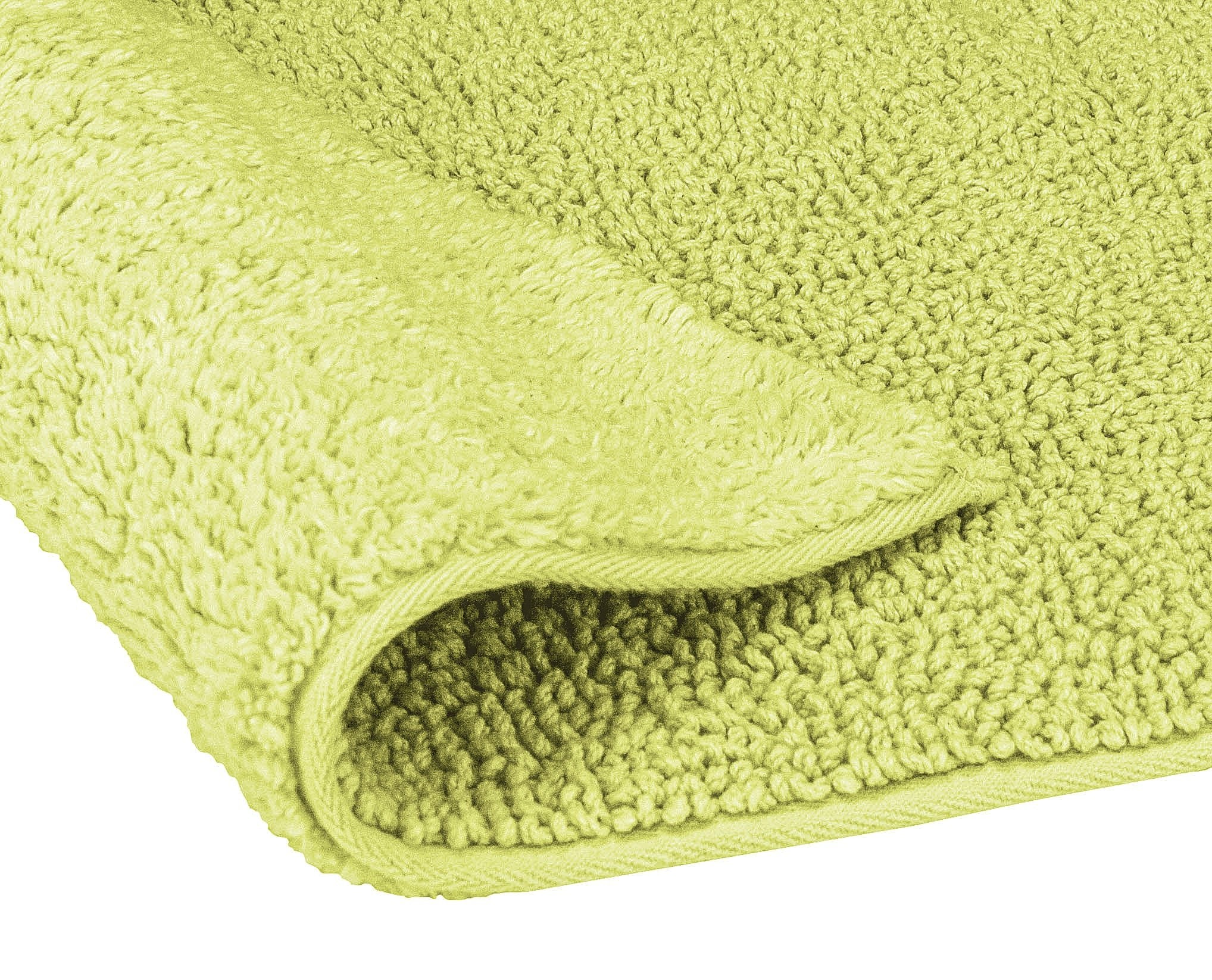 Badteppich CHRISSY Palme 60x100 cm in Detailansicht mit weicher, grüner Hochfloroberfläche.